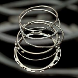 Silver Women's Eight Assorted Pattern Metal Bracelets